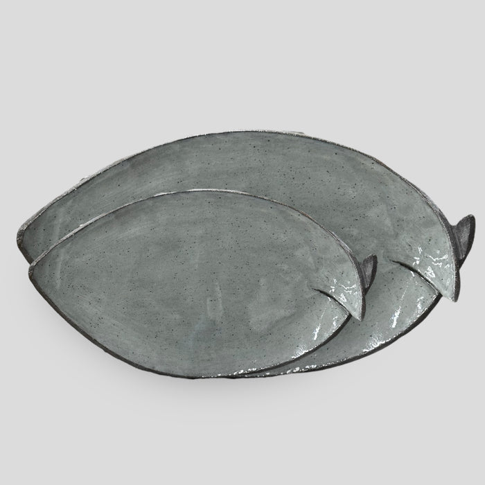 Blue fish-shaped serving plate.